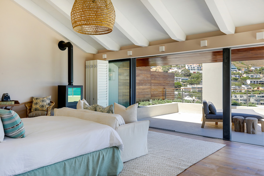 Master bedroom with wood burning fireplace - Cape Concierge - Cape Town Luxury Accommodation